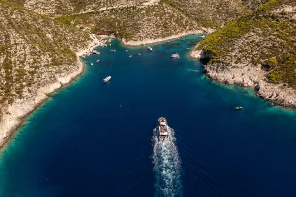 Rhodes: Beach Gem Exploration  Cruise with Greek Buffet, Drinks and Transfer included 